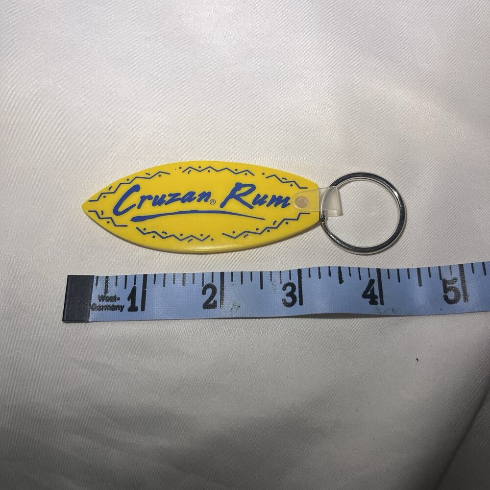 Vintage Cruzan Rum Yellow Surfboard Keychain Bar Advertising Promo Collectible